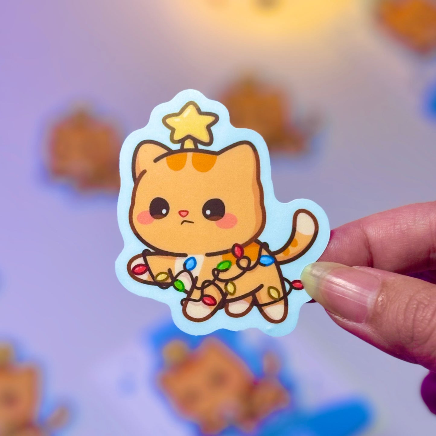 Orange Cat in Tangle of Christmas Lights Waterproof Sticker